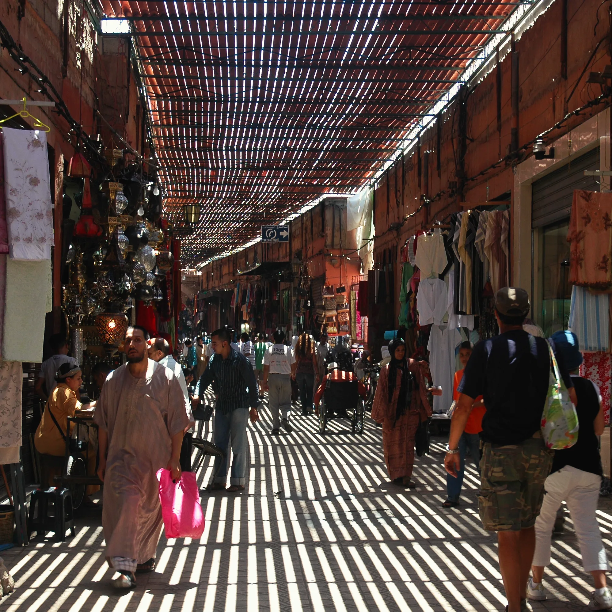 Shoppers under the slatted roof of the covered Souk Semmarine, Marrakech