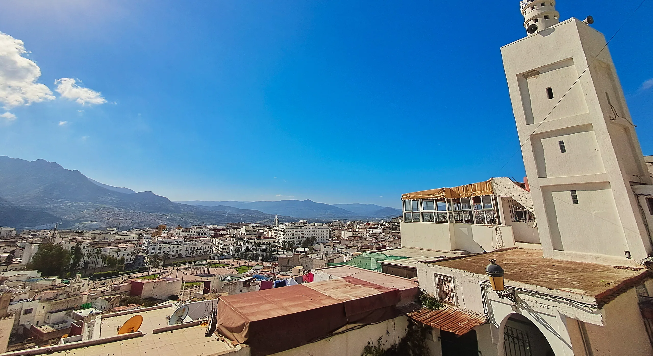 White houses of Tetouan below the Rif mountains, seen from a rooftop in the old medina